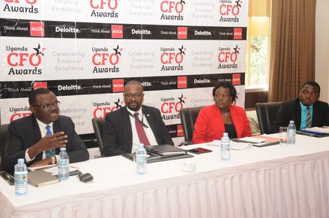 (L-R): Patrick Ayota- Deputy Managing Director NSSF together with Nobert Kagoro- Managing Partner Deloitte, Beatrice Isagayite- Head of ACCA Uganda and Ronald Amega, Chairperson Careers Guidance Committee at ACCA address the media at the launch of the 2nd edition of the annual CFO awards at the Kampala Serena Hotel