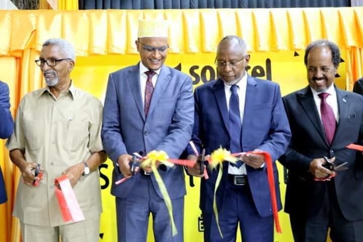 Officials of Dahabshiil Group and invited guests cut the ribbon to commemorate the official launch of 3G and 4G mobile and internet network, and eDahab mobile payment services for Somali customers and the floating of Somtel Shares to the public in Mogadishu