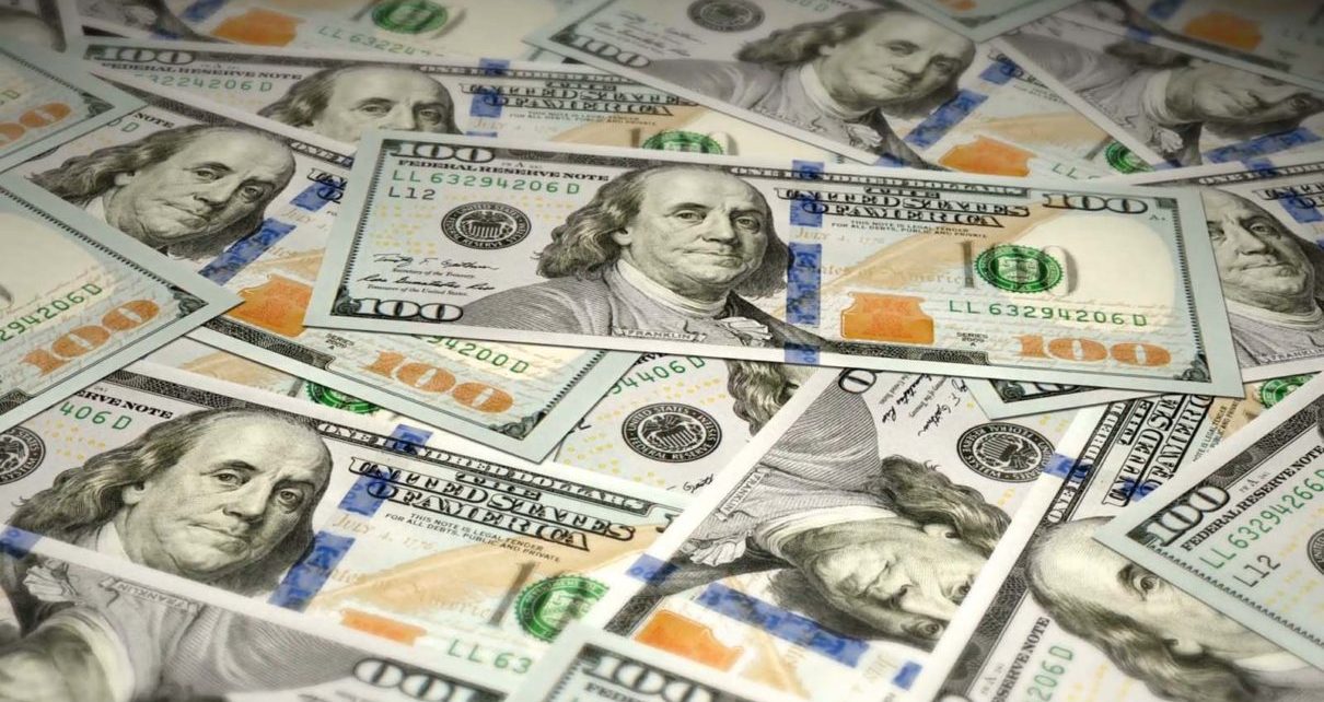The U.S. dollar eased on Tuesday, but still remained near a 16-month high in anticipation of Federal Reserve rate hikes.