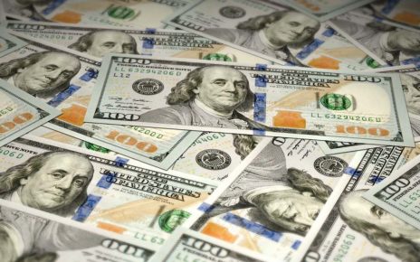 The U.S. dollar eased on Tuesday, but still remained near a 16-month high in anticipation of Federal Reserve rate hikes.