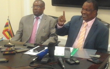 Water and environment Minister Sam Cheptoris (right) addressing the press in Kampala early in the week