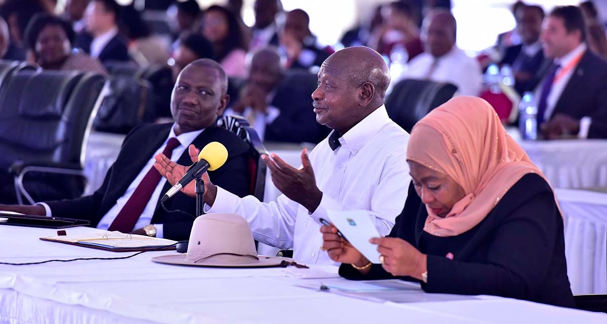 Museveni in the middle, Ms Suluhu (right) and Kenyan Deputy President Ruto at the Africa Now Summit in Munyonyo