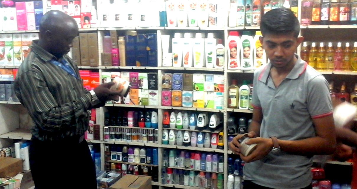 UNBS Officer checking the cosmetics in one of the Shop