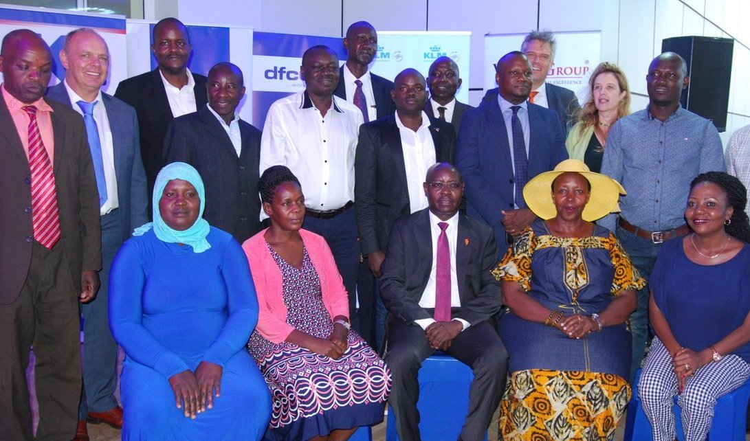 Pius Wakabi, the Permanent Secretary Ministry of Agriculture (centre) in a group picture with some of the farmers