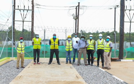 Umeme Managing Director Selestino Babungi inspecting the over sh7b new Tororo rural access line built recently.jpg