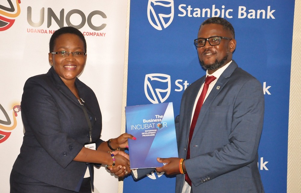Stanbic Bank Uganda through its Business Incubator has entered into a partnership with the Uganda National Oil Company to promote national content through the capacity building through offering business training for entrepreneurs, knowledge/sector information sharing and enterprise development.